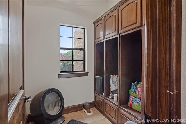 3892 Folsom Rd, Durant, OK 74701 - mudroom with light tile patterned floors and baseboards