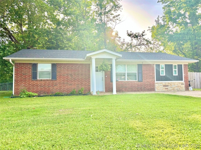 1105 NW 9th St, Stigler, OK 74462 - ranch-style home with brick siding and roof with shingles