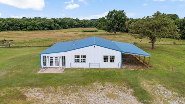 17652 S Hickory St, Sapulpa, OK 74066 - rear view of property featuring french doors, a yard, a carport, and driveway