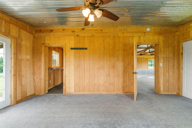 17652 S Hickory St, Sapulpa, OK 74066 - carpeted empty room with wooden walls and ceiling fan