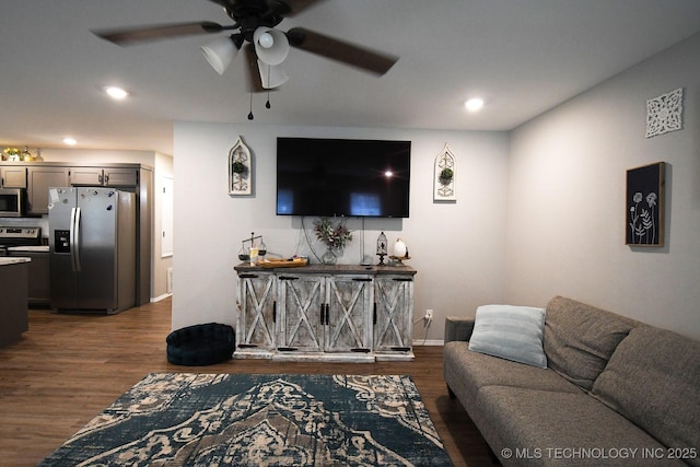 401 N Ash St, Sallisaw, OK 74955 - living area with dark wood-style floors, ceiling fan, and recessed lighting
