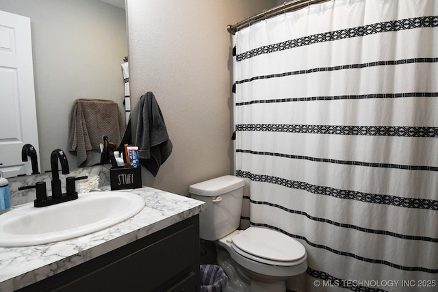 401 N Ash St, Sallisaw, OK 74955 - bathroom with vanity and a shower with curtain