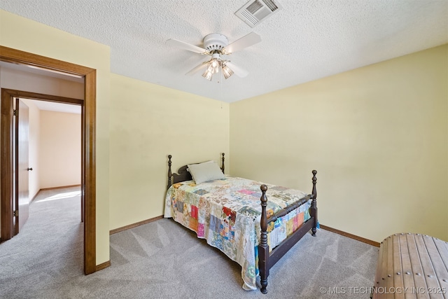 19585 Cottrell Dr, Claremore, OK 74019 - bedroom featuring carpet floors, a ceiling fan, and a textured ceiling
