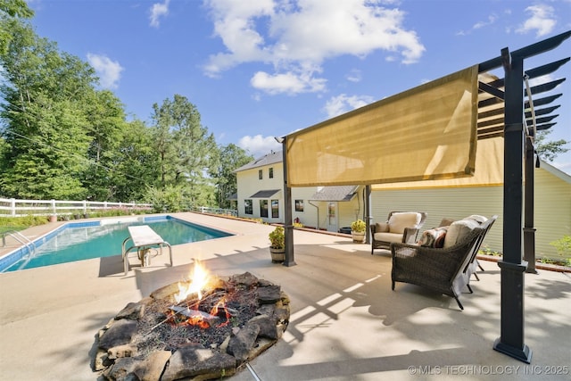 19585 Cottrell Dr, Claremore, OK 74019 - view of swimming pool with a patio area, a fenced backyard, and an outdoor living space with a fire pit