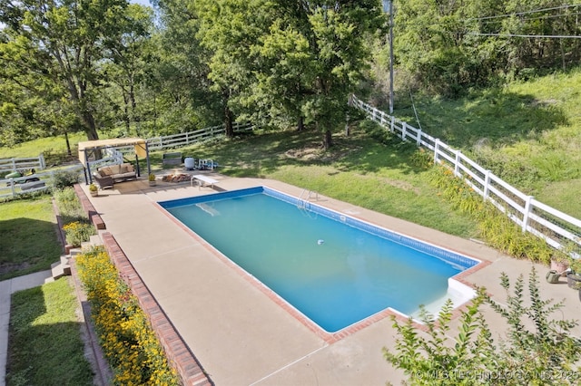 19585 Cottrell Dr, Claremore, OK 74019 - view of pool with an outdoor living space with a fire pit, a patio area, and view of scattered trees