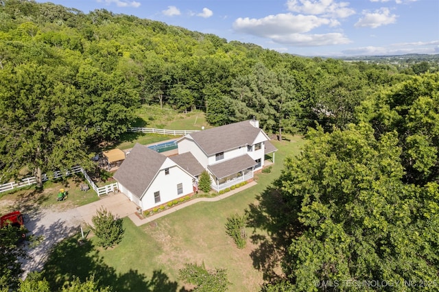 19585 Cottrell Dr, Claremore, OK 74019 - aerial view of property and surrounding area with a heavily wooded area