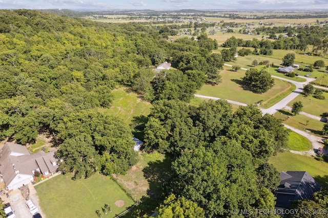 19585 Cottrell Dr, Claremore, OK 74019 - drone / aerial view of a heavily wooded area