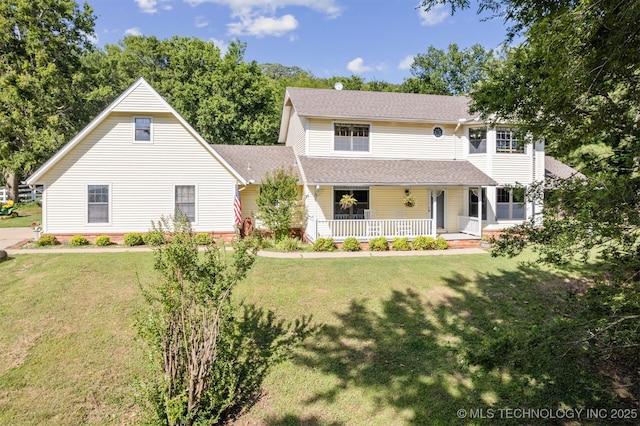 19585 Cottrell Dr, Claremore, OK 74019 - view of front of house with a porch, a front lawn, and roof with shingles