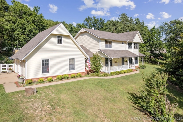 19585 Cottrell Dr, Claremore, OK 74019 - view of front facade with a porch, a front lawn, and roof with shingles