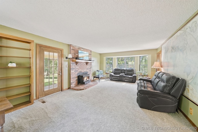 19585 Cottrell Dr, Claremore, OK 74019 - carpeted living room featuring a textured ceiling and baseboards