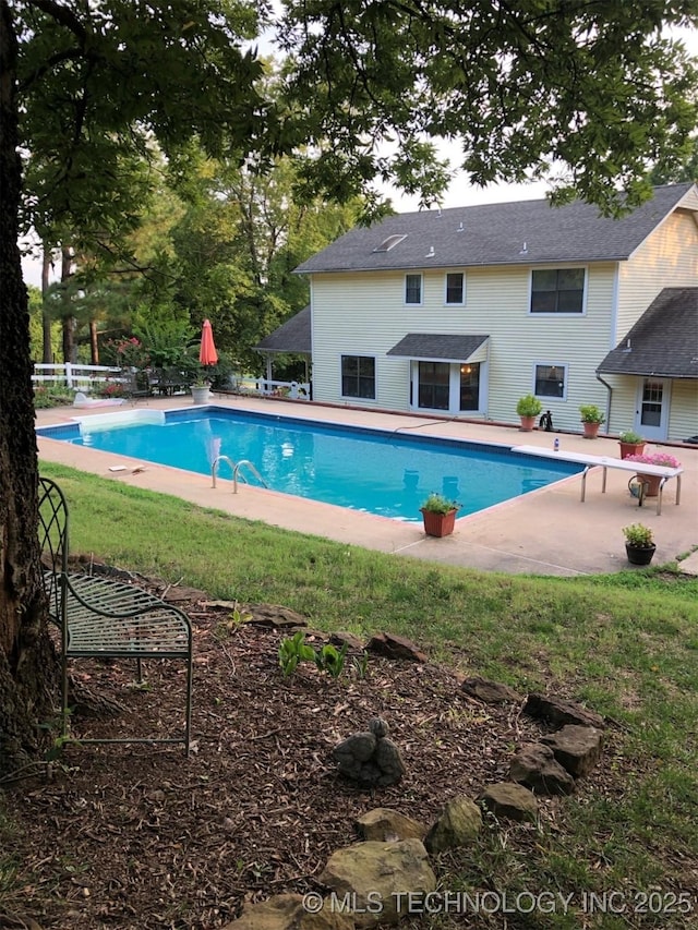 19585 Cottrell Dr, Claremore, OK 74019 - swimming pool with a diving board and a patio