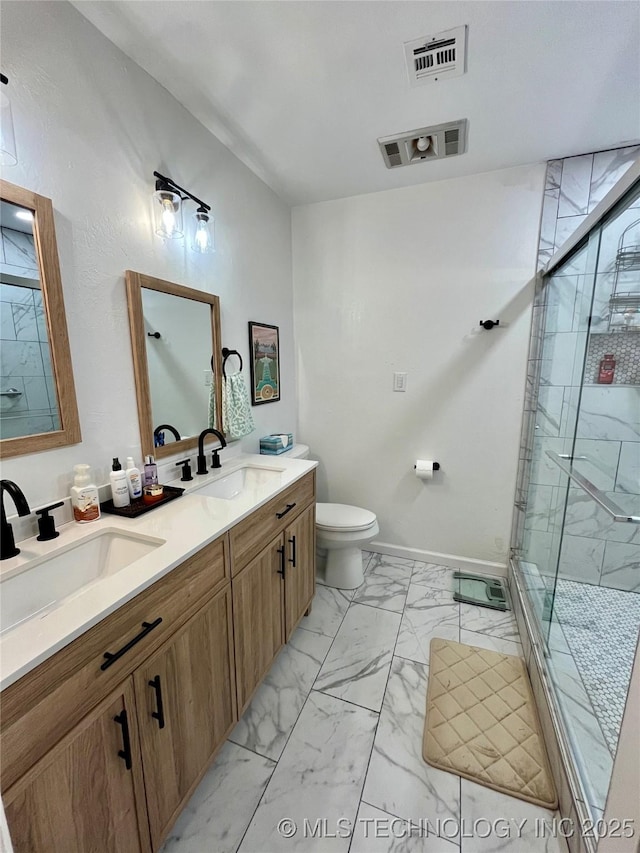 2807 Irving St, Muskogee, OK 74403 - full bathroom with marble look tile flooring, double vanity, and a shower stall