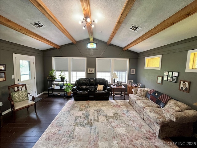 2807 Irving St, Muskogee, OK 74403 - living room featuring dark wood-style flooring and a textured ceiling
