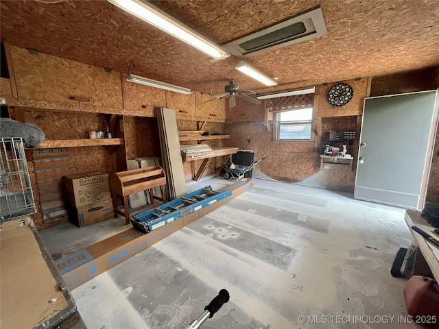2807 Irving St, Muskogee, OK 74403 - garage featuring a workshop area and a ceiling fan