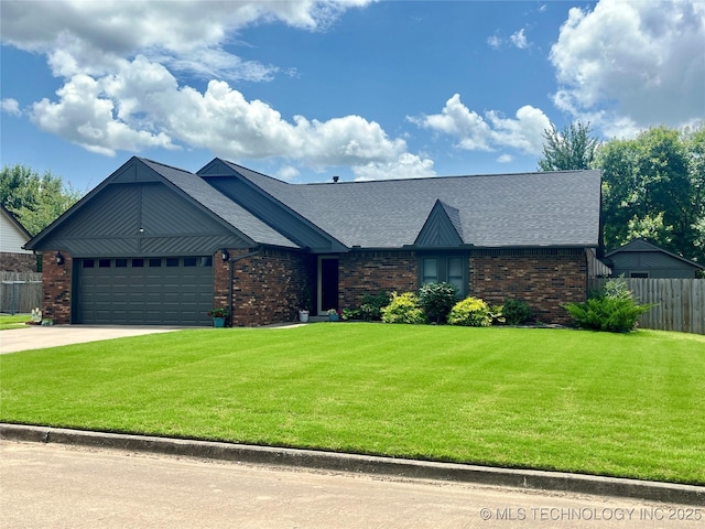 2807 Irving St, Muskogee, OK 74403 - view of front of property with brick siding, an attached garage, driveway, and a shingled roof