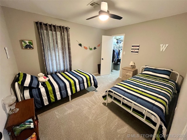 2807 Irving St, Muskogee, OK 74403 - carpeted bedroom with ceiling fan, a spacious closet, and a closet