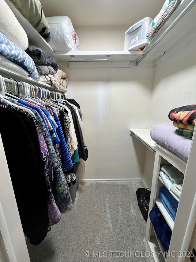 2807 Irving St, Muskogee, OK 74403 - walk in closet featuring carpet