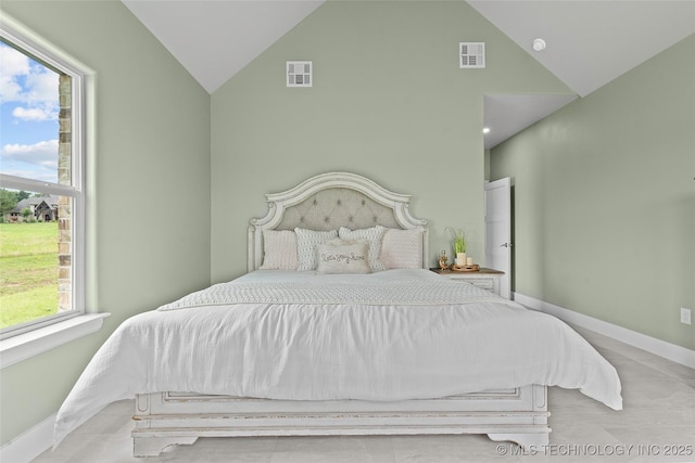 684 Chateau Bnd, Ardmore, OK 73401 - bedroom with baseboards and high vaulted ceiling