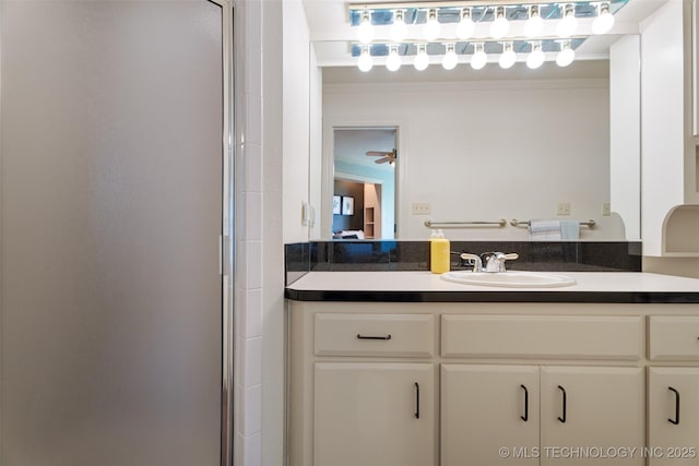 56901 E Walnut, Monkey Island, OK 74331 - bathroom featuring a stall shower, vanity, and crown molding