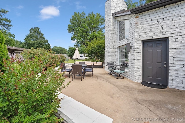 56901 E Walnut, Monkey Island, OK 74331 - view of patio / terrace featuring outdoor dining area and outdoor lounge area
