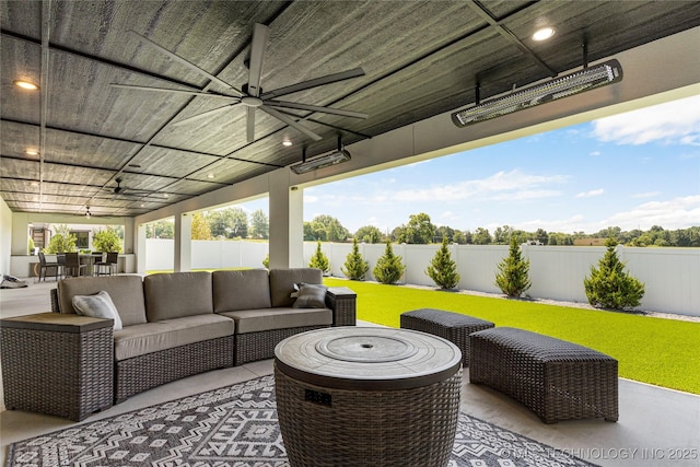 7221 E Norman St, Broken Arrow, OK 74014 - fenced backyard featuring a ceiling fan, an outdoor hangout area, and a patio