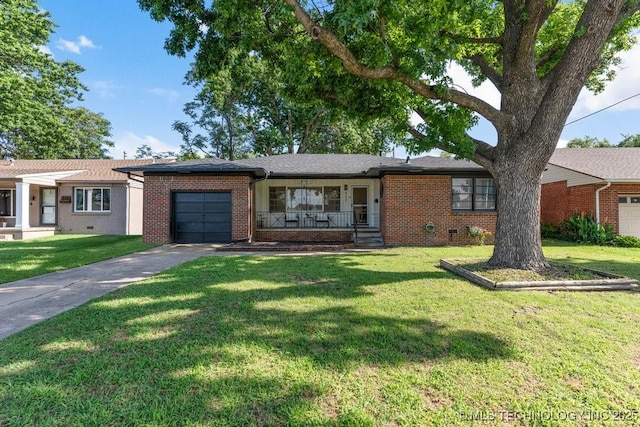 4331 E 28th St, Tulsa, OK 74114 - single story home featuring brick siding, a garage, concrete driveway, and covered porch