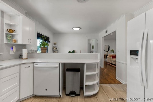 4331 E 28th St, Tulsa, OK 74114 - kitchen featuring white appliances, open shelves, a peninsula, and white cabinets