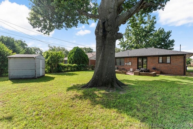 4331 E 28th St, Tulsa, OK 74114 - view of green lawn with a shed and a patio area