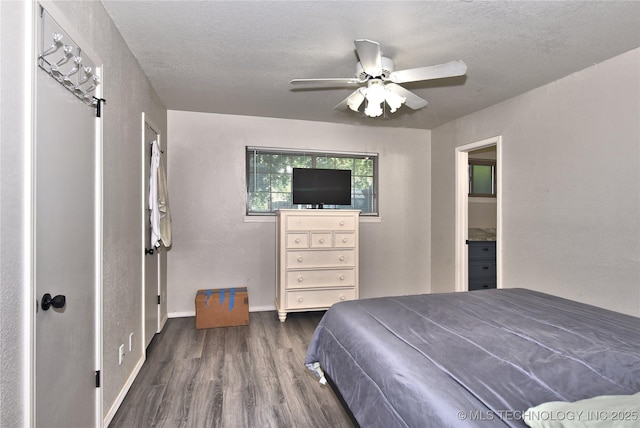 11003 E 27th St, Tulsa, OK 74129 - bedroom with wood finished floors, a textured ceiling, and a ceiling fan