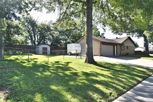 11003 E 27th St, Tulsa, OK 74129 - fenced yard with driveway, a shed, and a garage