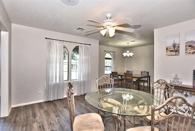11003 E 27th St, Tulsa, OK 74129 - dining space with wood finished floors, a textured ceiling, and ceiling fan