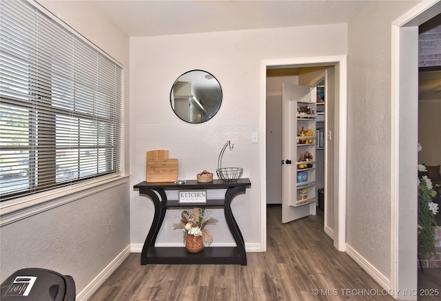11003 E 27th St, Tulsa, OK 74129 - corridor featuring wood finished floors and a textured wall