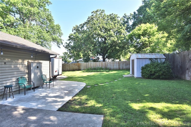11003 E 27th St, Tulsa, OK 74129 - fenced backyard with a storage unit and a patio area