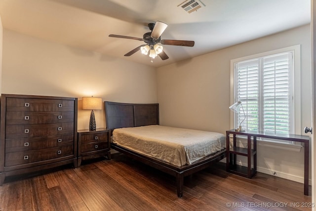9314 N 96th E Ave, Owasso, OK 74055 - bedroom with dark wood finished floors and ceiling fan