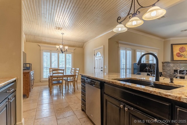 9314 N 96th E Ave, Owasso, OK 74055 - kitchen with dishwasher, healthy amount of natural light, a chandelier, ornamental molding, and light stone counters