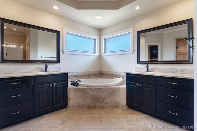 9314 N 96th E Ave, Owasso, OK 74055 - full bathroom with two vanities, a bath, and recessed lighting