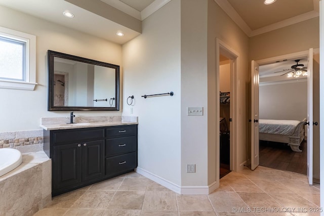 9314 N 96th E Ave, Owasso, OK 74055 - bathroom featuring ornamental molding, vanity, a bath, a ceiling fan, and connected bathroom