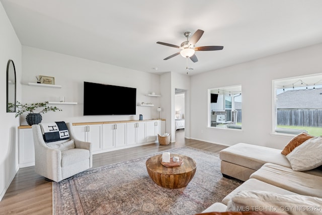 9423 E 132nd Pl S, Bixby, OK 74008 - living area with light wood-style flooring and a ceiling fan