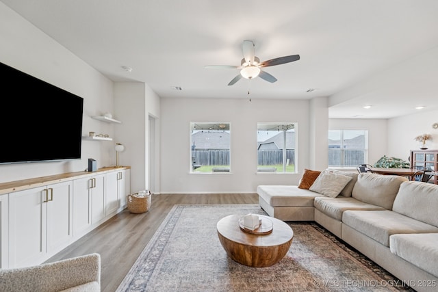 9423 E 132nd Pl S, Bixby, OK 74008 - living room with light wood-style floors, ceiling fan, and recessed lighting