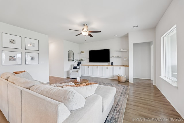 9423 E 132nd Pl S, Bixby, OK 74008 - living area featuring ceiling fan and wood finished floors