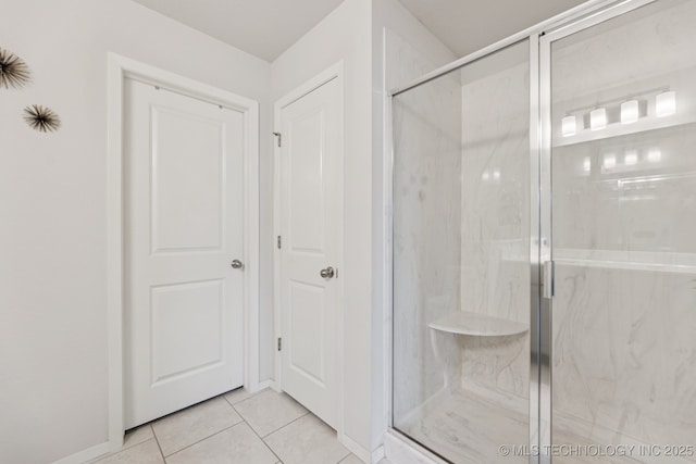 9423 E 132nd Pl S, Bixby, OK 74008 - bathroom with a marble finish shower and tile patterned floors