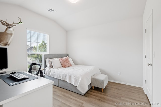 9423 E 132nd Pl S, Bixby, OK 74008 - bedroom featuring vaulted ceiling, light wood-type flooring, and an office area