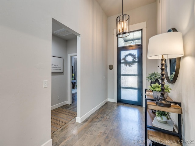 13642 S 21st Pl E, Bixby, OK 74008 - entrance foyer with a chandelier and wood finished floors