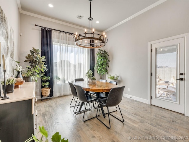 13642 S 21st Pl E, Bixby, OK 74008 - dining space featuring a chandelier, light wood-style floors, crown molding, and recessed lighting