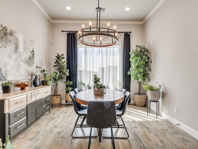 13642 S 21st Pl E, Bixby, OK 74008 - dining area featuring light wood-style floors, crown molding, a chandelier, and recessed lighting