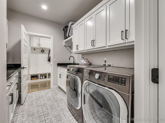 13642 S 21st Pl E, Bixby, OK 74008 - laundry area with washing machine and dryer, cabinet space, and recessed lighting