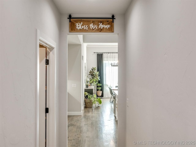 13642 S 21st Pl E, Bixby, OK 74008 - corridor featuring wood finished floors and baseboards