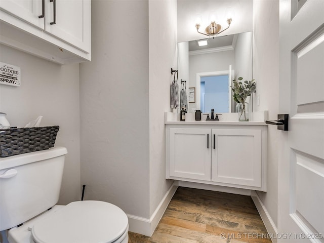 13642 S 21st Pl E, Bixby, OK 74008 - bathroom featuring crown molding, vanity, and wood finished floors