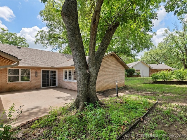 1525 Pecan Pl, Bartlesville, OK 74003 - view of yard featuring a patio