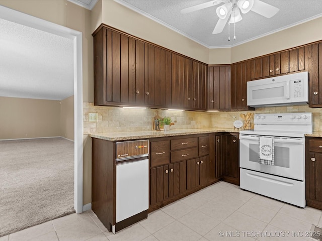 1525 Pecan Pl, Bartlesville, OK 74003 - kitchen featuring white appliances, a textured ceiling, ceiling fan, backsplash, and dark brown cabinets